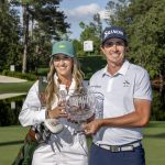 Nicolas Echavarria of Colombia lifts the Par 3 Contest trophy following a playoff during the Par 3 Contest prior to the start of the 2025 Masters Tournament at Augusta National Golf Club, Wednesday, April 09, 2025.
