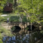 Justin Rose of England crosses the Nelson Bridge at No. 13 during the third round of the Masters at Augusta National Golf Club, Saturday, April 12, 2025.